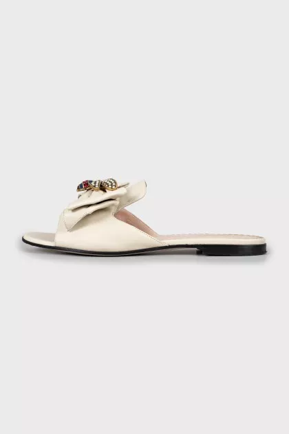 Leather slides with gold decoration