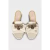 Leather slides with gold decoration