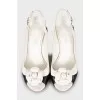 Black and white sandals with decor