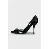 Patent leather shoes with decor and rhinestones