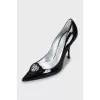 Patent leather shoes with decor and rhinestones