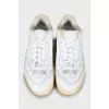 Men's white sneakers with perforations
