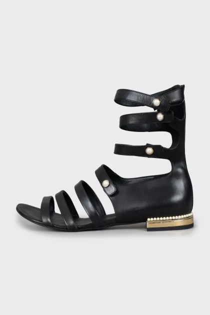 Leather sandals decorated with beads