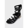 Leather sandals decorated with beads