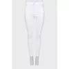 White high-waisted skinny jeans