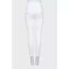 White high-waisted skinny jeans