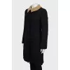 Fitted coat with knitted neck
