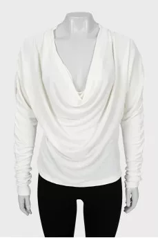 White blouse with draped sleeves
