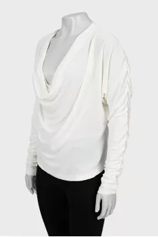 White blouse with draped sleeves