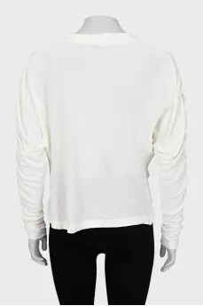 White blouse with draped sleeves