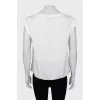 White blouse with slits on the sides