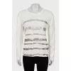 Knitted sweater with silver print