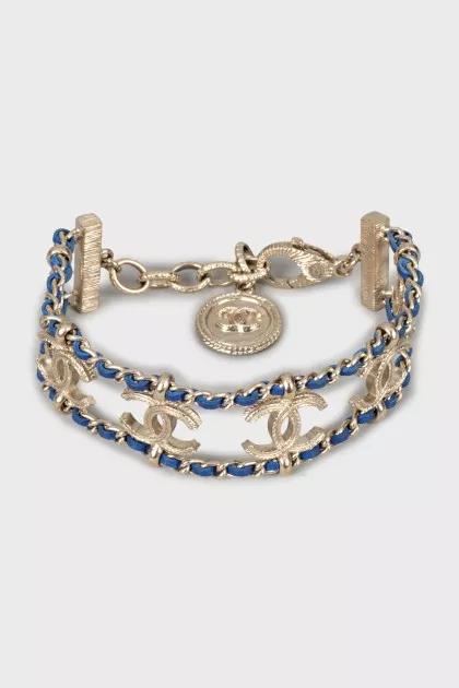 Bracelet with weave and signature logo