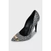 Suede shoes decorated with rhinestones