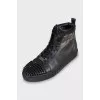 Men's sneakers decorated with spikes