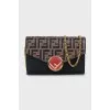 Printed leather crossbody bag