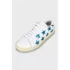 Leather sneakers decorated with sequins