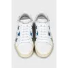 Leather sneakers decorated with sequins