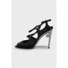 Black sandals with silver heels