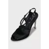 Black sandals with silver heels