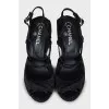 Black sandals with silver heels