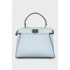 Peekaboo ISeeU bag with tag