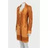 Leather raincoat with perforated pattern