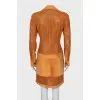Leather raincoat with perforated pattern