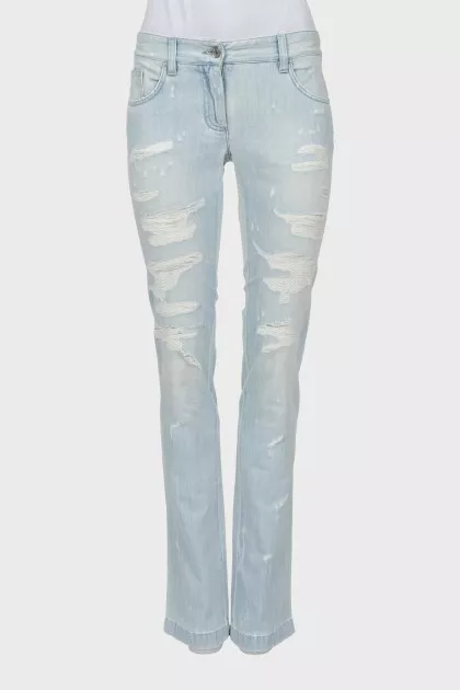 Mid-rise jeans with ripped effect