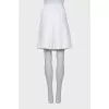 White pleated skirt