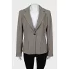 Jacket with a button in a small print