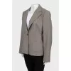 Jacket with a button in a small print