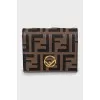 Leather wallet with embossing and tag