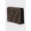 Leather wallet with embossing and tag