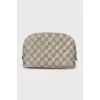 Cosmetic bag in branded print