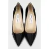 Patent black pointed toe shoes