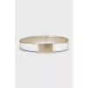 White belt with gold buckle