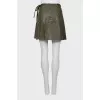 Wrap leather mini skirt