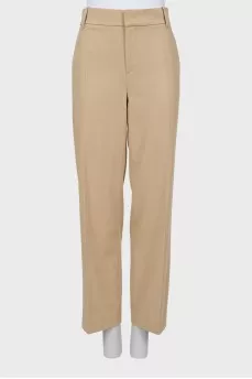 Beige trousers with arrows
