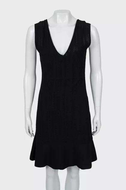 Fitted black dress with perforations