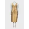 Golden dress with a slit at the back