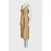 Golden dress with a slit at the back