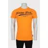 Men's orange T-shirt with rhinestones