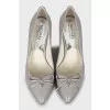 Pumps decorated with bows