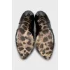 Patent leather heeled ankle boots