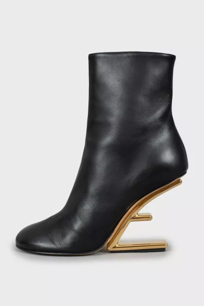 Leather ankle boots with gold heels