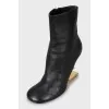 Leather ankle boots with gold heels