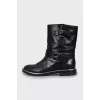 Leather boots with gold hardware