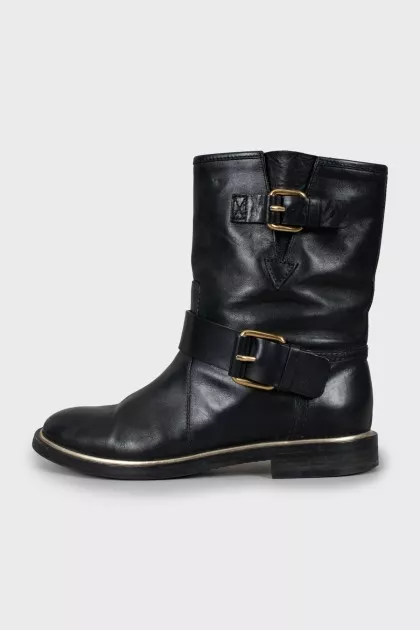 Leather boots with gold hardware