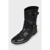 Leather boots with gold hardware